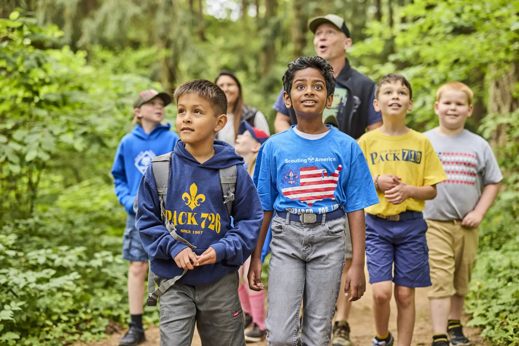 Scouts smiling at the lake